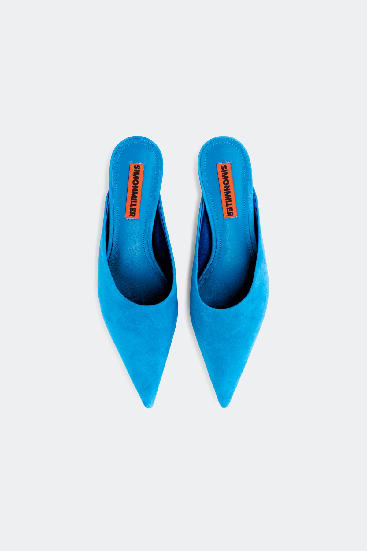 Suede Arrow Mule In Aqua Blue